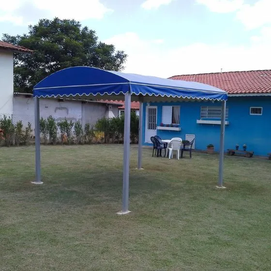 Reforma de Toldos e Coberturas em Salto SP Reforma de Toldos e Coberturas em Salto SP — Cobertura em quintal residencial coberto